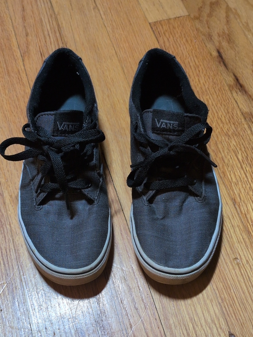Vans youth Black Canvas Low-Top Sneakers with White Sole size 5